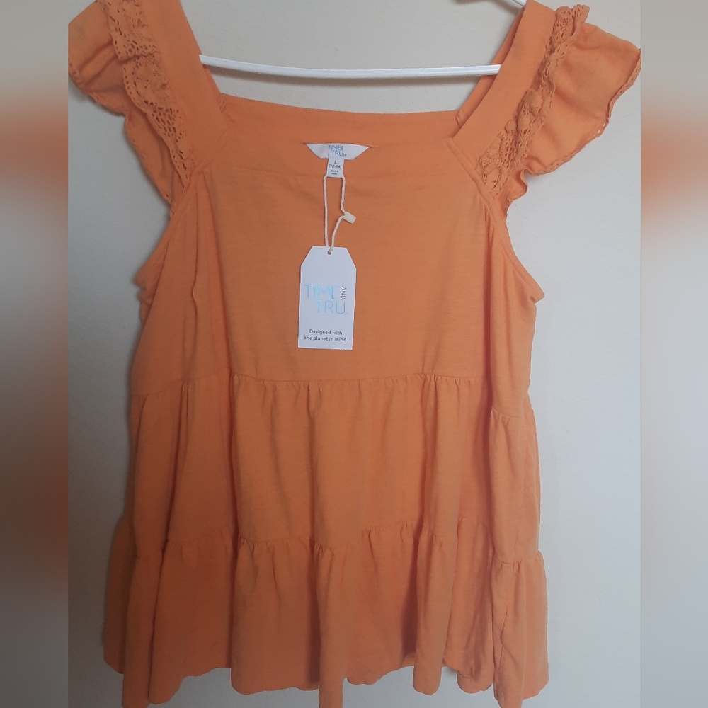 Woman s shirt orange with lace